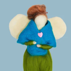 MariaElena | Handmade needle felted angel with auburn hair and teal blue cloak holding herself over a pink heart, cream wings spread, standing on green base – Guardian of Guidance comfort angel